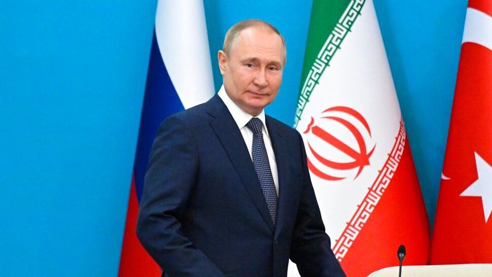 Russian President Vladimir Putin arrives to attend a joint news conference with Iranian President Ebrahim Raisi and Turkish President Recep Tayyip Erdogan following their talks at the Saadabad palace, in Tehran, Iran.