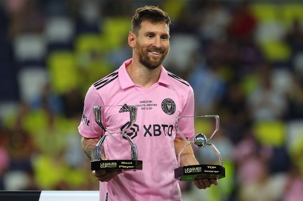 Lionel Messi #10 of Inter Miami poses with his Best Player Award and Top Scorer Award after defeating the Nashville SC to win the Leagues Cup 2023 final match in Nashville, Tennessee, U.S.