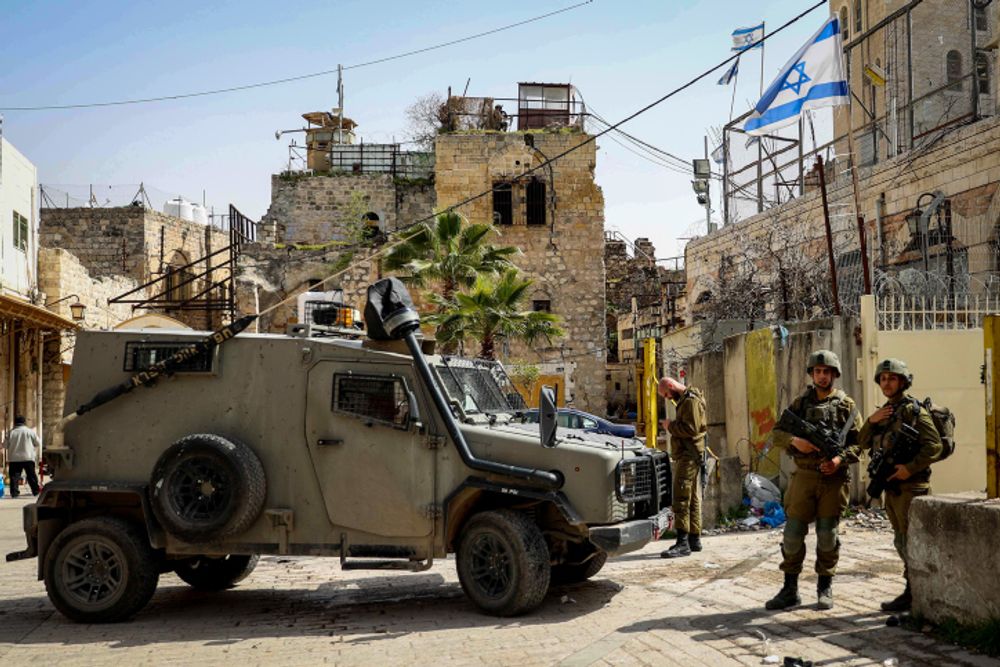 Israeli soldiers in the Old City of Hebron, the West Bank, on March 17, 2022.