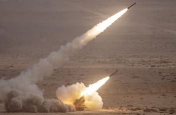 A US M142 High Mobility Artillery Rocket System (HIMARS) fires salvoes during the "African Lion" military exercise in southwestern Morocco on June 30, 2022.