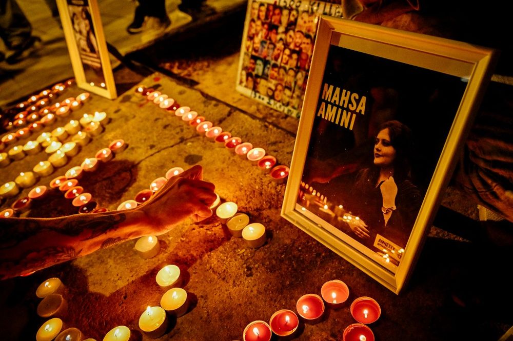 Iranian refugees and Iranians living in Greece lit candles forming the name 'Mahsa' during a demonstration to commemorate 40 days from the death of Iranian Mahsa Amini while in police custody in Iran, in central Athens, Greece.