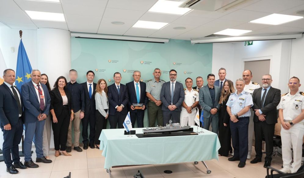 Members of Israel's Ministry of Defense strike a deal with their Cypriot counterparts 