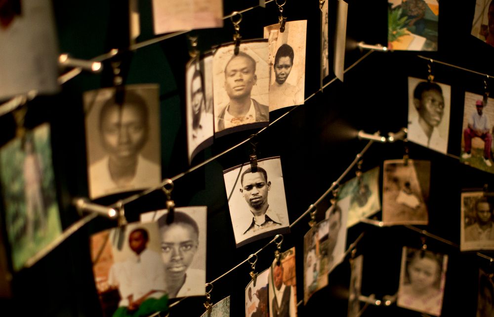 FILE: Family photographs of some of those who died hang in a display in the Kigali Genocide Memorial Centre in Kigali, Rwanda, April 5, 2014.