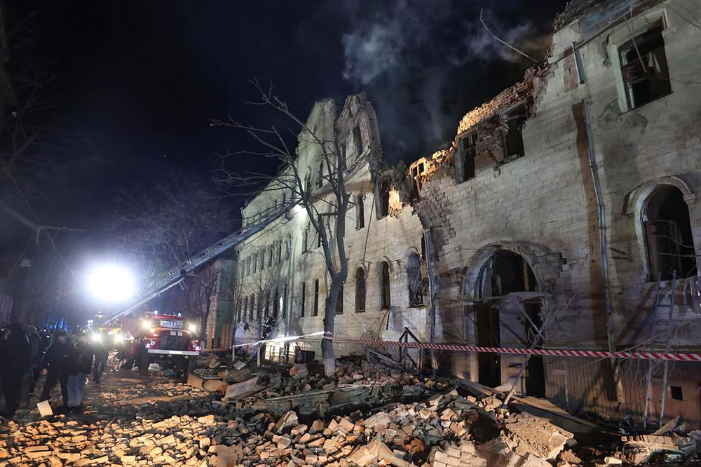 In this photo provided by the Kharkiv Regional Administration, an apartment building damaged in a Russian rocket attack is seen in Kharkiv, Ukraine, in the early hours of Wednesday, Jan. 17, 2024.