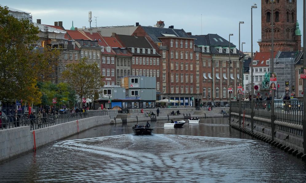 Boats seen in the canal through central Copenhagen, Denmark, Monday, Oct. 31, 2022.