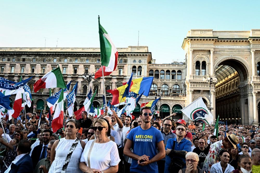 Supporters of Italian far-right party Brothers of Italy and its leader Giorgia Meloni, attend a rally as part of the campaign for general elections, in Piazza Duomo in Milan, Italy on September 11, 2022.