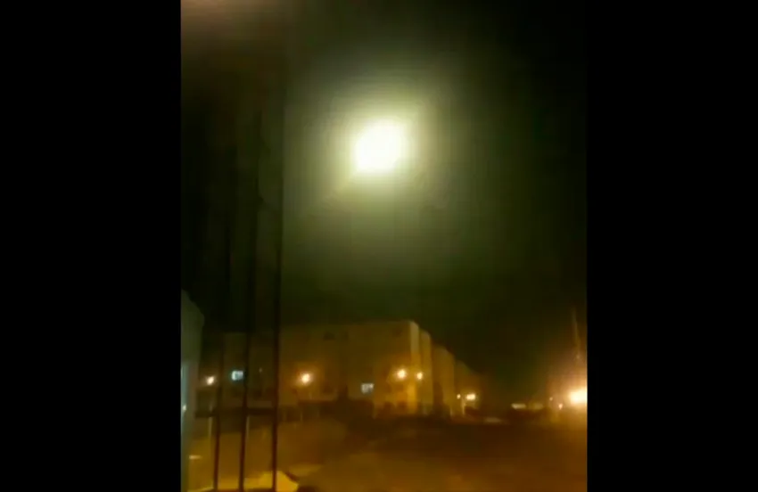 This image taken from a video on Wednesday Jan. 8, 2020 and provided by Nariman Gharib shows an object said to be the Ukrainian jetliner flying in sky at the moment of explosion with a flash of light.