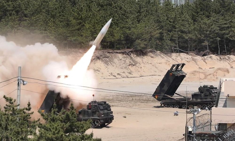 This handout photo taken on May 25, 2022 and provided by the South Korean Defence Ministry in Seoul shows a US Army Tactical Missile System (ATACMS) firing a missile from an undisclosed location on South Korea's east coast.