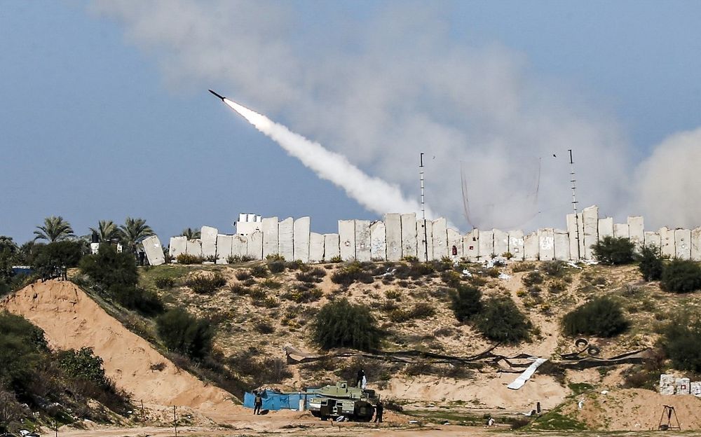 Rockets are fired during a military drill by Palestinian Islamist movement Hamas and other Palestinian armed factions in Gaza City on December 29, 2020.