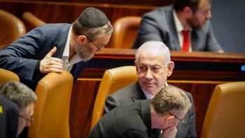 Prime Minister Benjamin Netanyahu (seated) in the Knesset, Israel's parliament