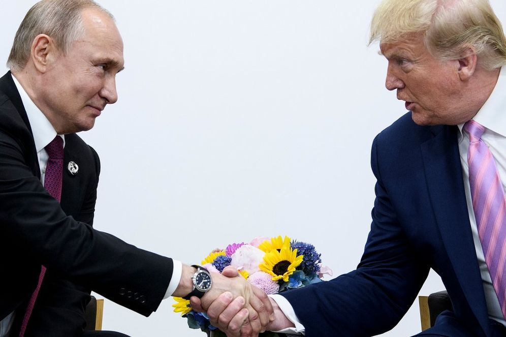 US President Donald Trump (R) attends a meeting with Russia's President Vladimir Putin during the G20 summit in Osaka on June 28, 2019.