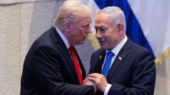 President Donald Trump talks with Israel's Prime Minister Benjamin Netanyahu at the Knesset, Israel's parliament, Monday, Oct. 13, 2025, in Jerusalem. 
