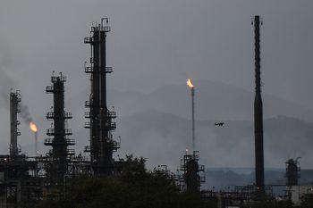 Gas is flared at the Jose Antonio Anzoategui oil complex in Barcelona, Anzoategui State, Venezuela, Sunday, July 3, 2022