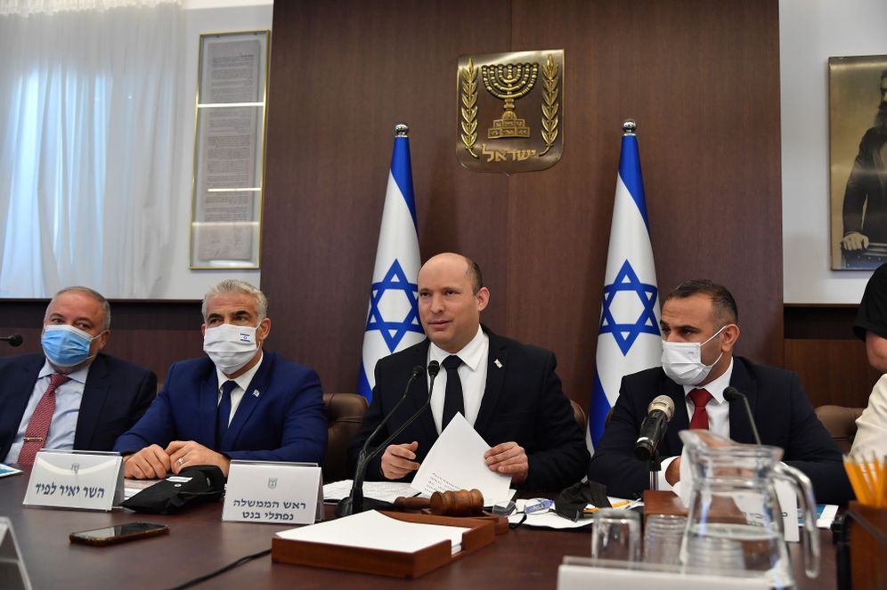 Israeli Prime Minister Naftali Bennett leads a cabinet meeting at the Prime Minister's Office in Jerusalem on October 24, 2021