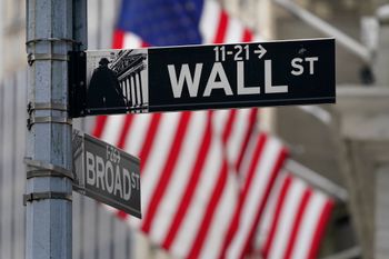 A street sign is displayed at the New York Stock Exchange in New York, November 23, 2020.