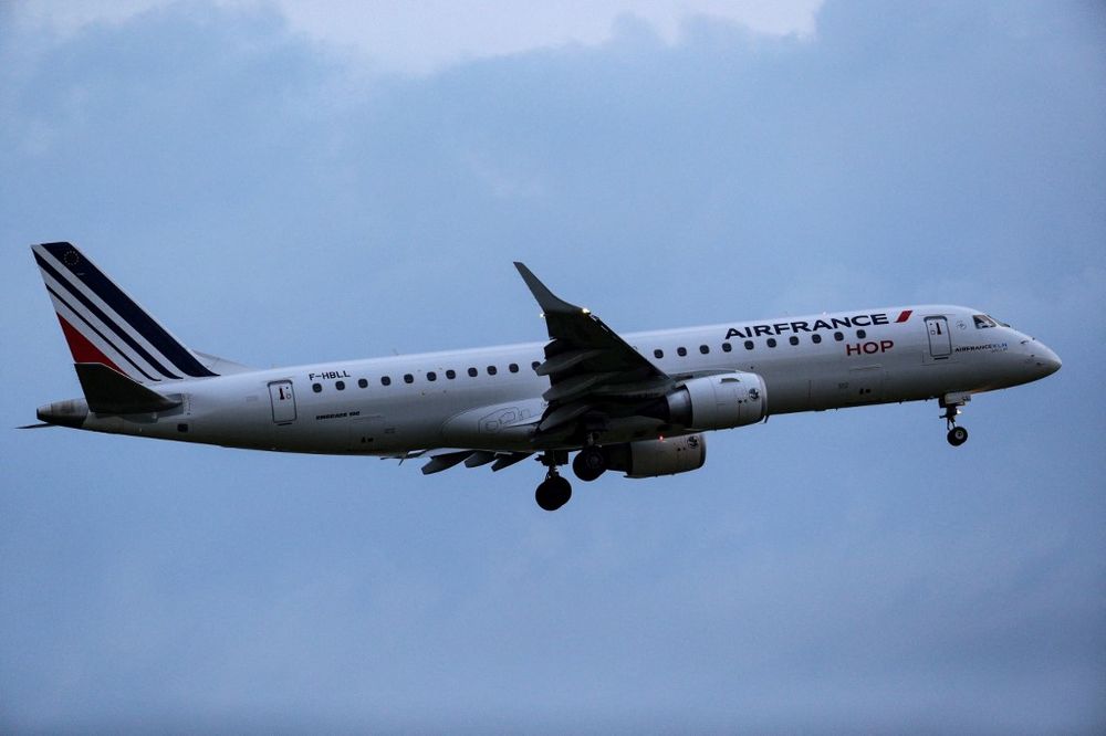 In this file photo taken on June 3, 2021, the Embraer 190 F-HBLL aircraft of Air France-KLM group takes off from the tarmac of Roissy-Charles de Gaulle airport in France.