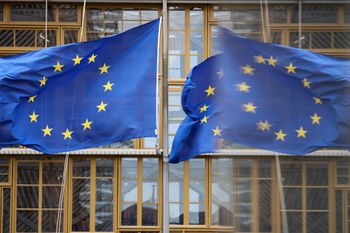 European Union flags are seen outside the European Council's building in Brussels, Belgium, on March 17, 2022.