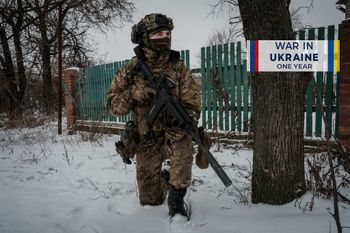 A serviceman of the Ukrainian Armed Forces Vedmak (Witcher) unit patrols on the frontline near Bakhmut, eastern Ukraine.