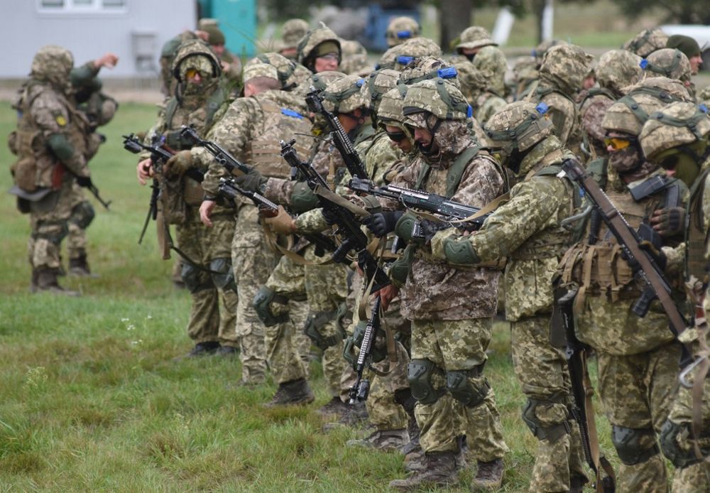Ukrainian servicemen take part in the joint Rapid Trident military exercises with the United States and other NATO countries not far from Lviv, Ukraine, on September 24, 2021.