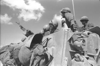 Israeli soldiers move along the Quneitra-Damascus road on the Syrian front during the Yom Kippur War.