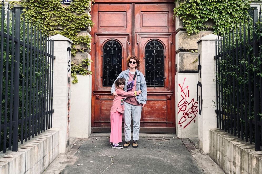 Nine-year-old Myroslava (L) posing with her mother Anna Kaliukh in Krakow, Poland, after fleeing fighting in Ukraine, on May 29, 2022.