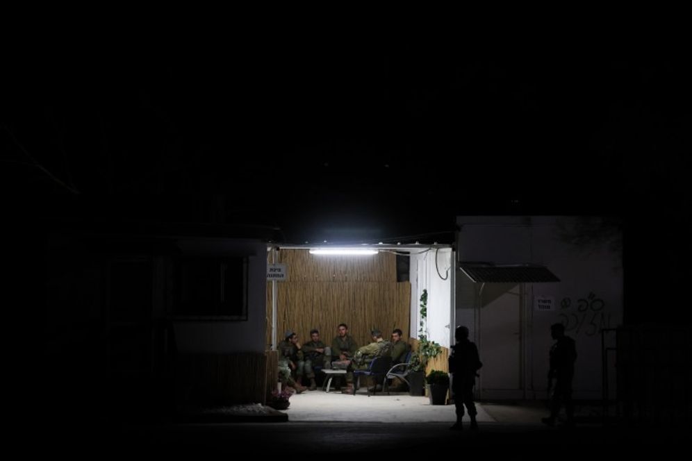Israeli soldiers seen in Kibbutz Be'eri, near the Israeli-Gaza border, in southern Israel