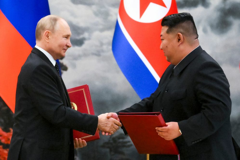 Kristina Kormilitsyna, Sputnik, Kremlin Pool Photo via AP Russian President Vladimir Putin, left, and North Korea's leader Kim Jong Un shake hands after a signing ceremony of the new partnership in Pyongyang, North Korea, on Wednesday, June 19, 2024.