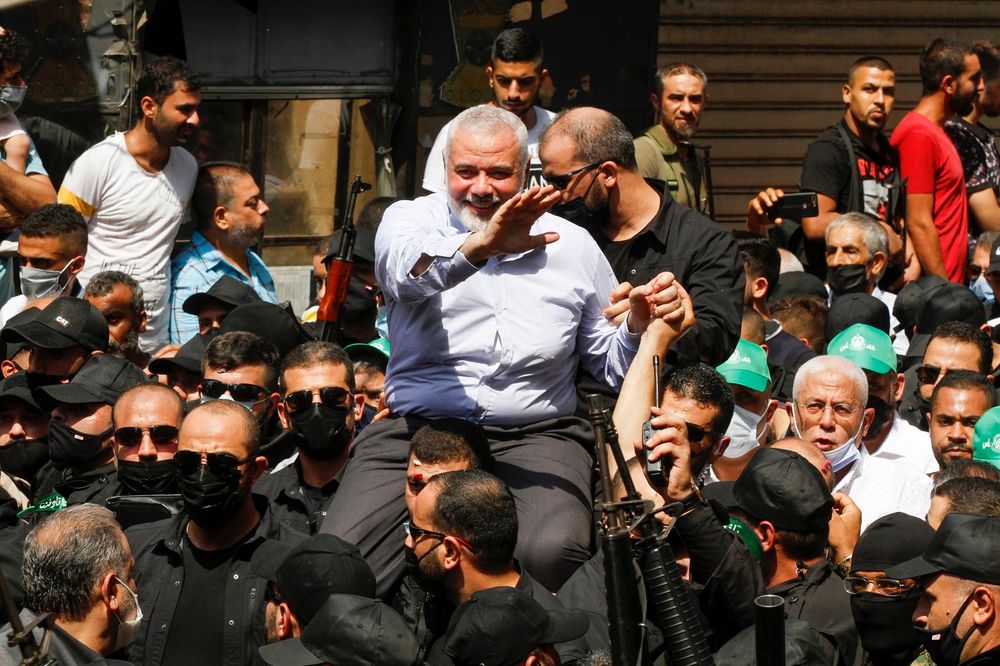 Hamas' political bureau chief Ismail Haniyeh greets supporters during a visit to the Ain el-Helweh camp, Lebanon's largest Palestinian refugee camp, near the southern coastal city of Sidon, on September 6, 2020.