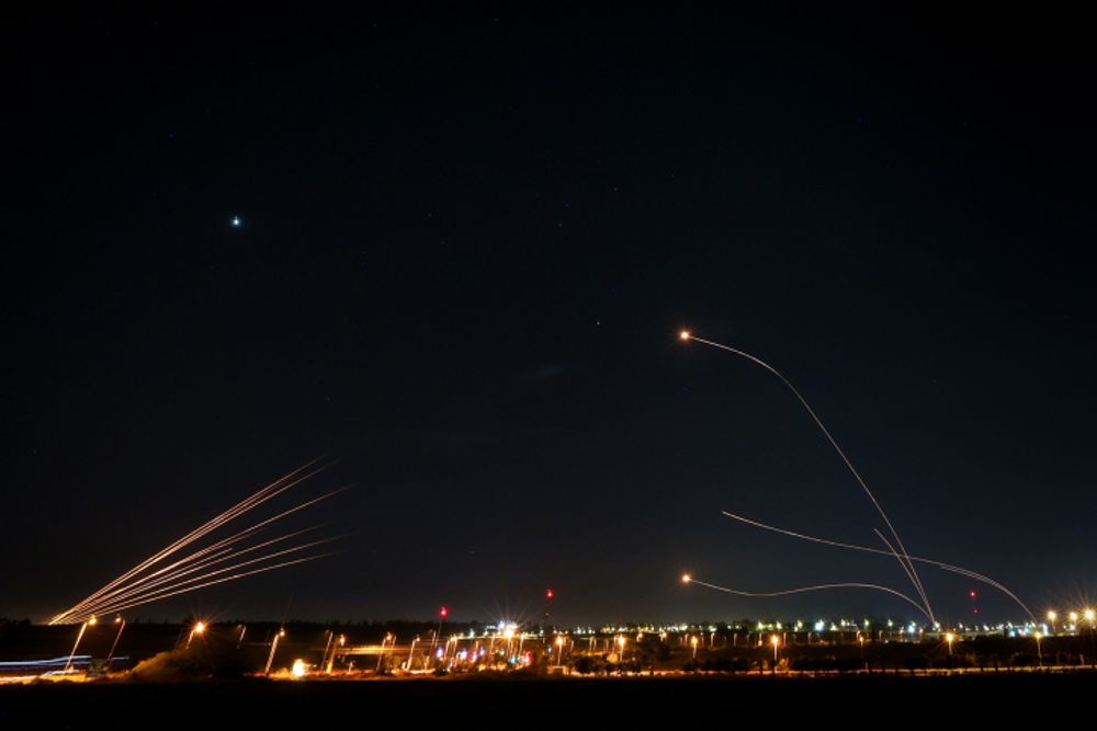 Iron dome aeries defense system fires interception missiles as rockets are fired from the Gaza Strip,  in the southern city of Sderot, Israel.
