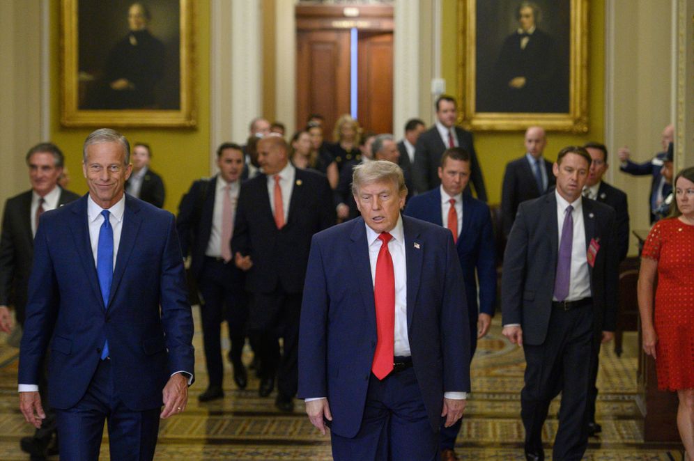 Senate Majority Leader John Thune, R-S.D., left, and President Donald Trump arrive for lunch with Republican senators, in the Capitol, in Washington, Wednesday, June 24, 2026
