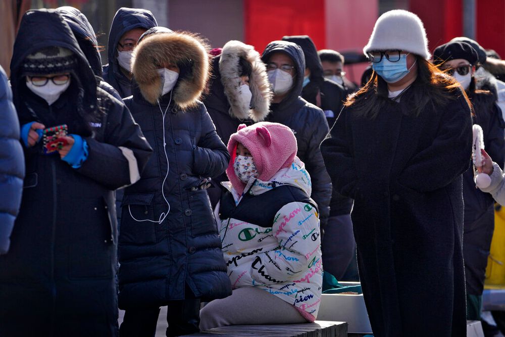 Residents wearing face masks in Beijing, China.