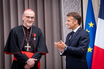 X French President Emmanuel Macron with Cardinal Pizzaballa