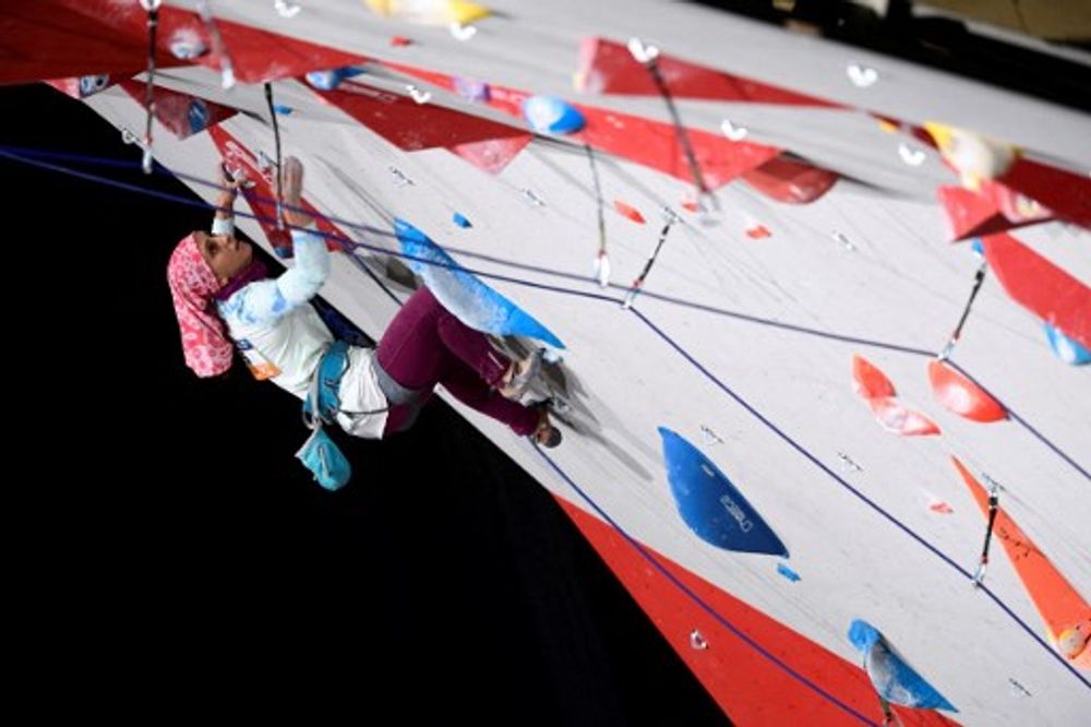 Iran's Elnaz Rekabi competes in the Women's Lead qualification at the indoor World Climbing and Paraclimbing Championships 2016 in Paris, France, on September 14, 2016.