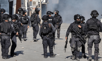 Les forces de sécurité israéliennes lors des émeutes à Shuafat, Jérusalem-Est