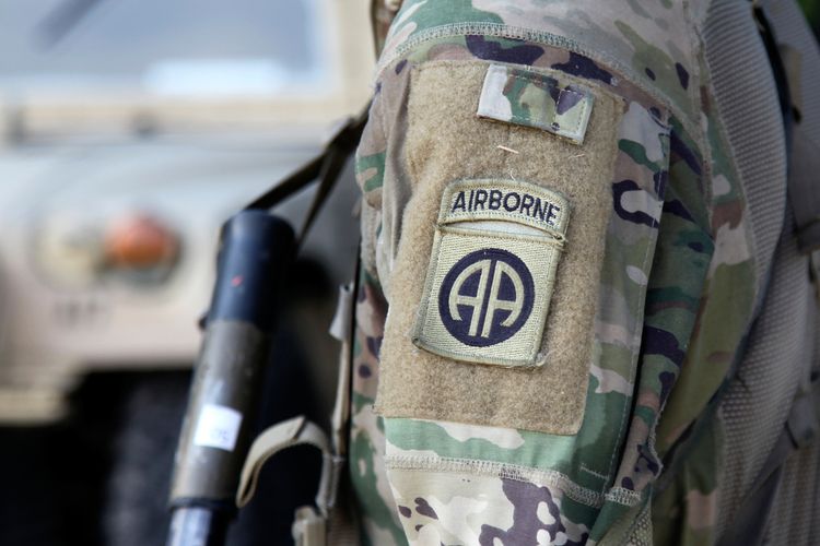 A paratrooper from the 82nd Airborne Division participates in artillery training during a field exercise at Fort Bragg, North Carolina. Archive