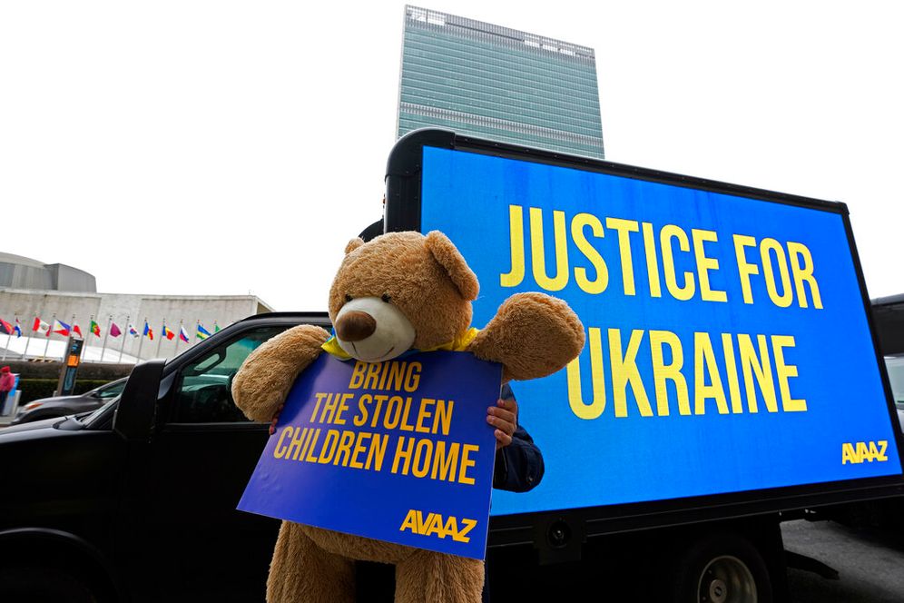 People protest against Russia's invasion of Ukraine near the United Nations headquarters in New York, the United States.