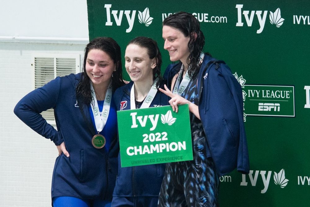 University of Pennsylvania swimmer Lia Thomas smiles on the podium after winning the 500-yard freestyle event at Blodgett Pool on February 17, 2022, in Cambridge, Massachusetts, US.