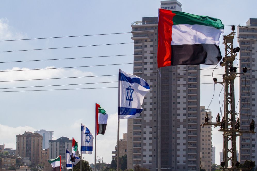 Israeli and United Arab Emirates flags seen on the side of a road in the city of Netanya, on August 16, 2020.