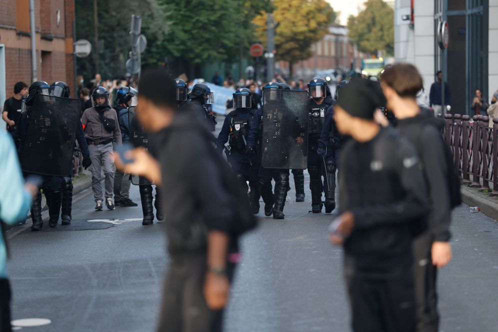 (AP Photo/Jean-Francois Badias) Students face French policemen during a protest to demand more resources, in Lille, France, Thursday, Oct. 1, 2026.