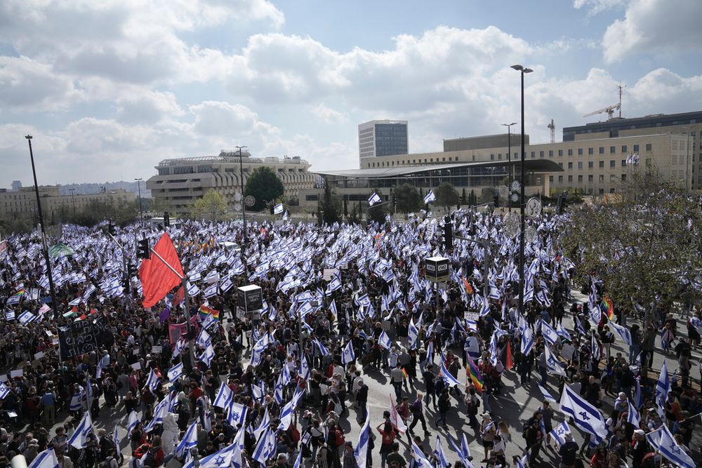 Israelis protest against Prime Minister Benjamin Netanyahu's judicial overhaul plan outside the parliament in Jerusalem, Israel.