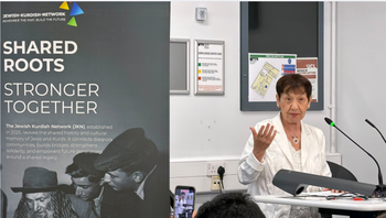 A Jewish Kurdish Network banner bearing the message “Shared Roots, Stronger Together,” and Ofra Bengio speaking at the conference in London