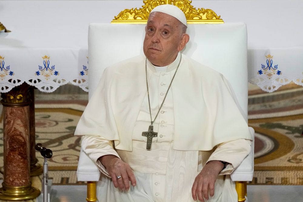 Pope Francis listens to speeches during a Marian prayer with the diocesan clergy at the Notre Dame de la Garde Basilica, in Marseille, France