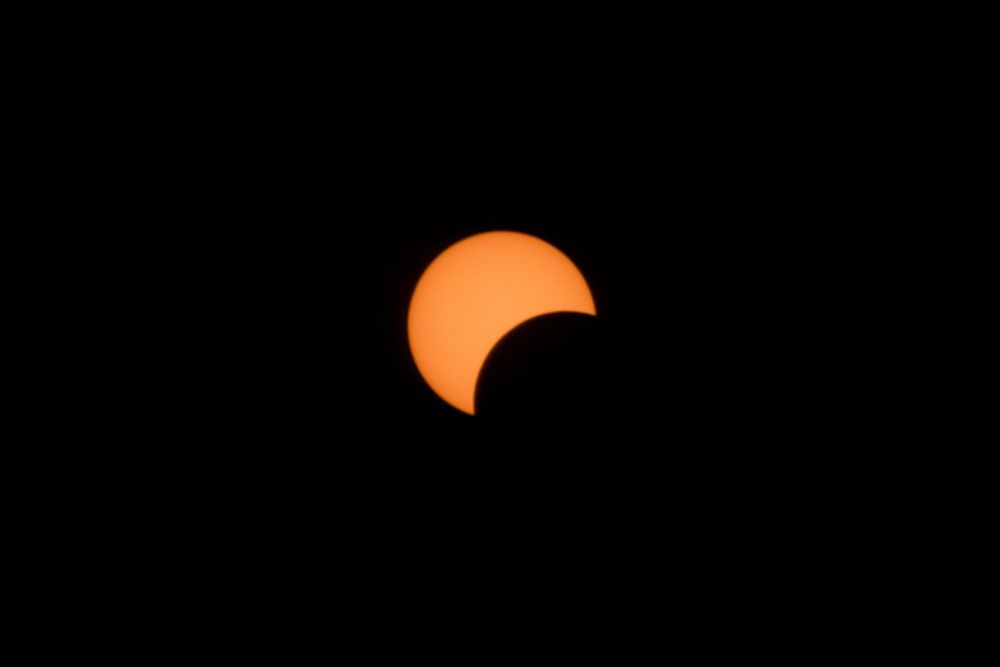 View of a partial solar eclipse as seen from Mount Scopus in Jerusalem on June 21, 2020.