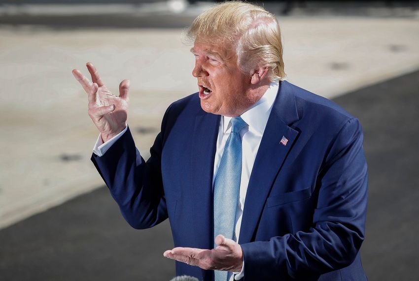 President Donald Trump gestures while speaking to the media on the South Lawn of the White House in Washington, Friday, Oct. 4, 2019, before his departure to nearby Walter Reed National Military Medical Center in Bethesda, Md.