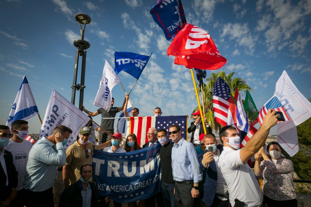 Israeli supporters of US President Donald Trumps wave US and Israeli flags to support his candidacy for president in Jerusalem on October 27, 2020.