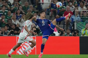 Japan's Hiroki Ito, right, and Tunisia's Hannibal Mejbri battle for the ball during a World Cup Group F soccer match in Guadalupe, near Monterrey, Mexico, Saturday, June 20, 2026. 