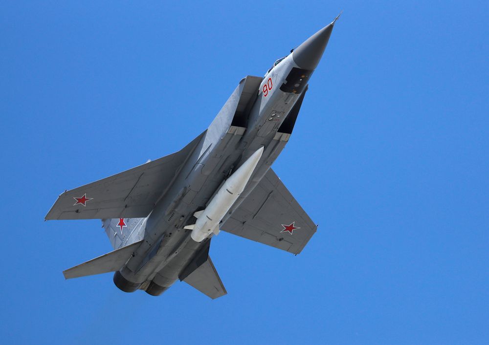 A Russian Air Force MiG-31K jet carries a high-precision hypersonic aero-ballistic missile Kh-47M2 Kinzhal in Moscow, Russia.