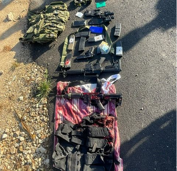 Weapons and explosives confiscated from the terrorists' vehicle.