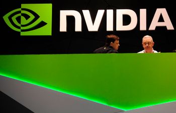 People gather in the Nvidia booth at the Mobile World Congress mobile phone trade show in Barcelona, Spain.