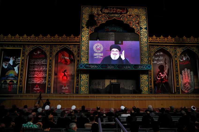 Hezbollah leader Sayyed Hassan Nasrallah, speaks via a video link, during the first day of Ashoura, in the southern suburb of Beirut, Lebanon, Saturday, Aug. 31, 2019